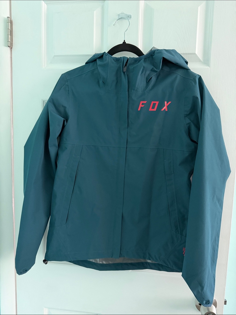Fox Women’s Teal Hooded Rain Jacket with Pink Logo
